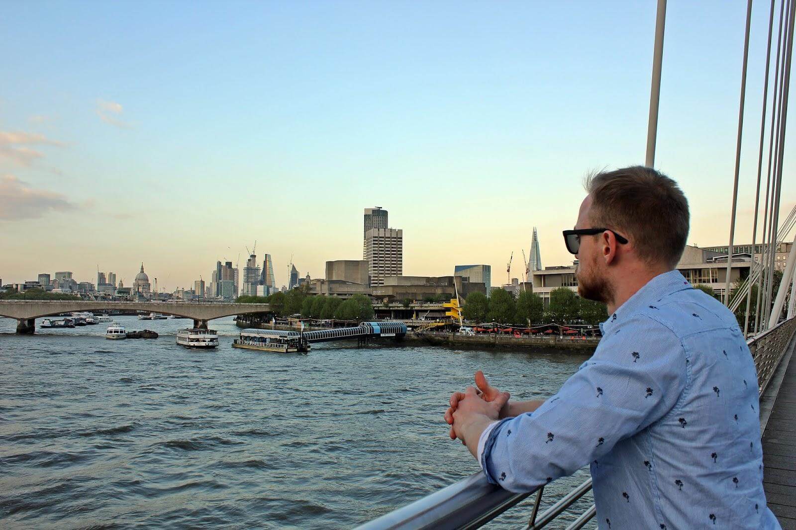 University graduation moment by the Thames