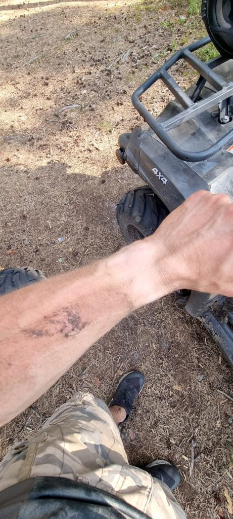 ATV crossing wooden bridge