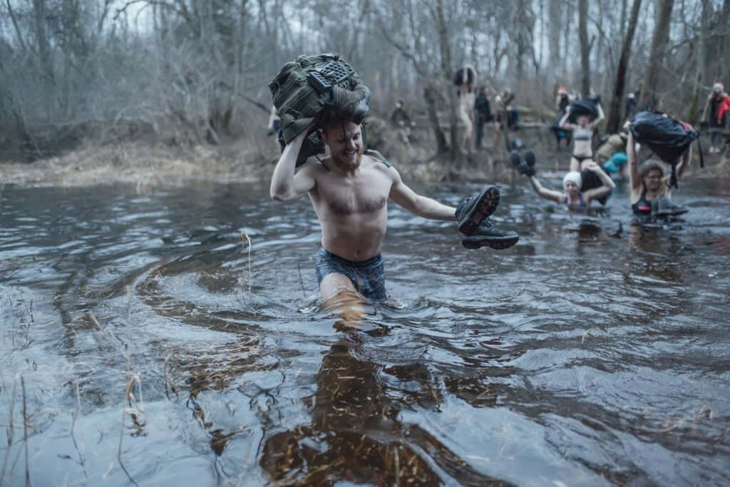 Autumn hike, crossing small Latvian river