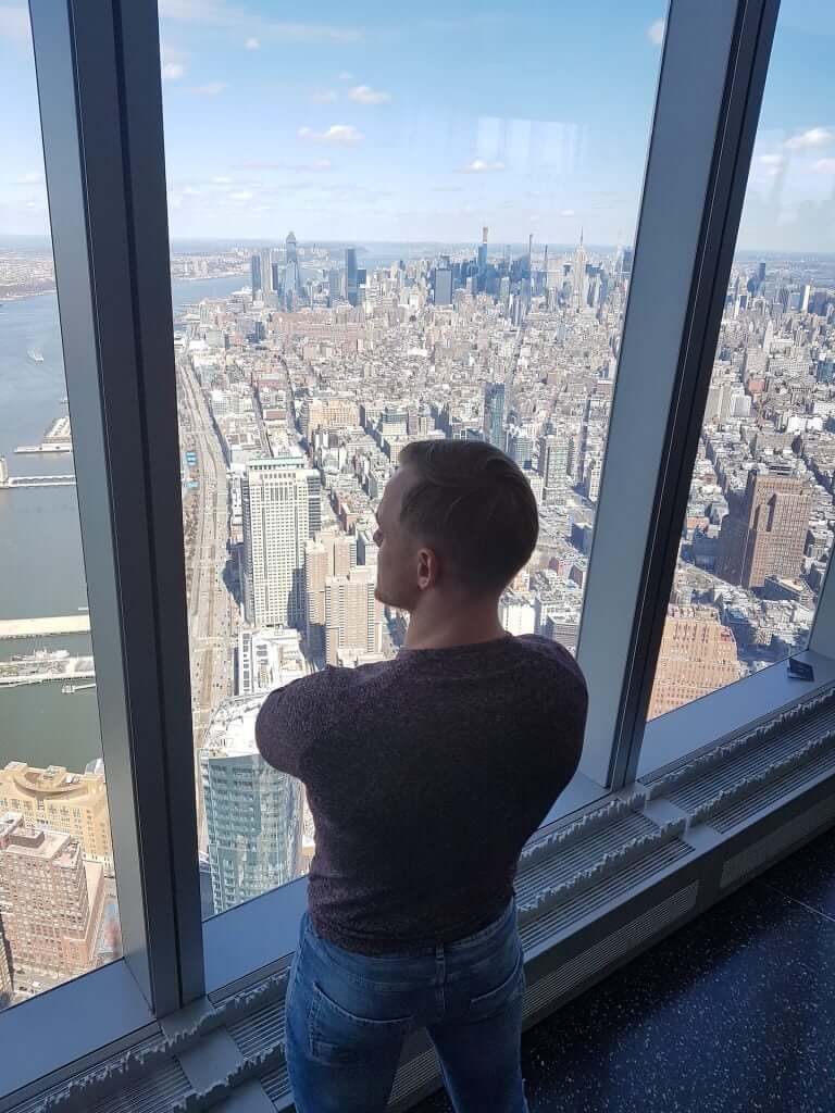 Looking down at tiny cars and people