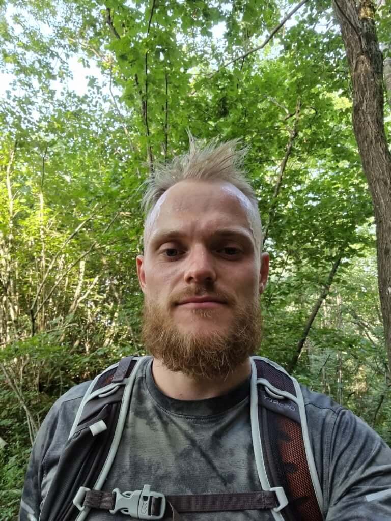 Hiking through the forest trail