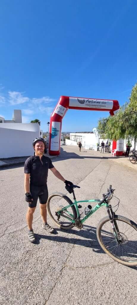 Person with bike on paved area