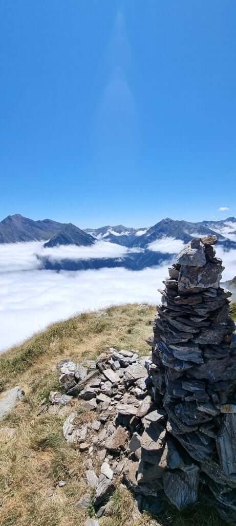 Clear blue sky above the clouds